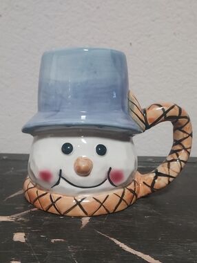 Ceramic Snowman Mug with Light Blue Hat and Tan Handle